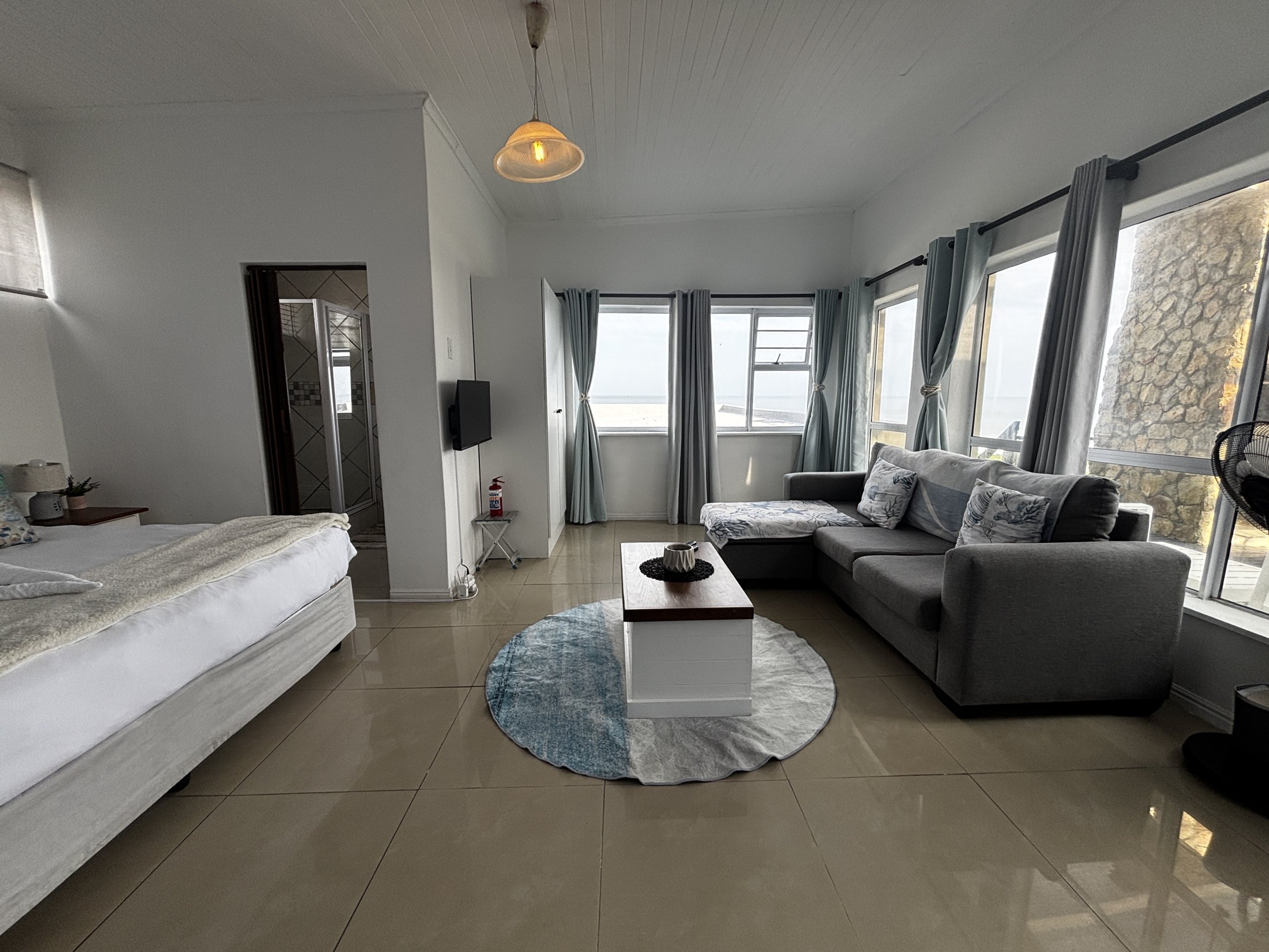 King room with seating area at Seaview Sunsets in Room 3